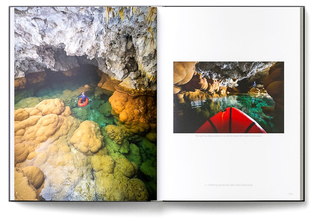 Sample double-page of the 'Lechuguilla Cave' book showing a caver crossing a deep cave lake in a packraft