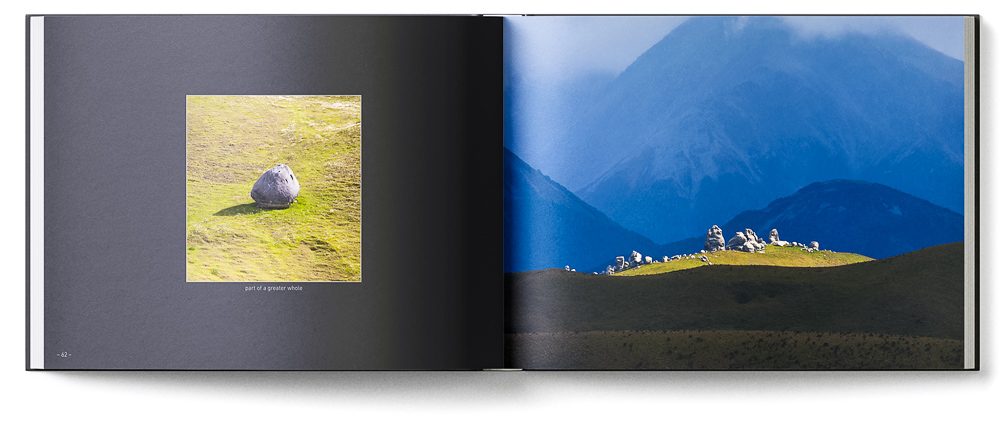Sample double page of the 'New Zealand Karst' book showing sculpted limestone boulders