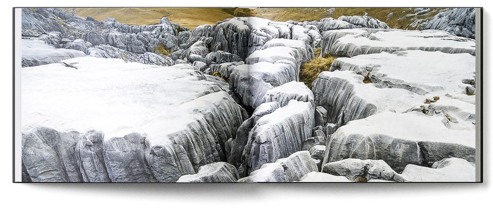 Sample double page of the 'New Zealand Karst' book showing karstified limestone