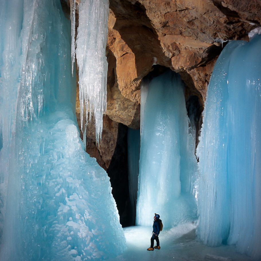 Caver surrounded by giant ice domes
