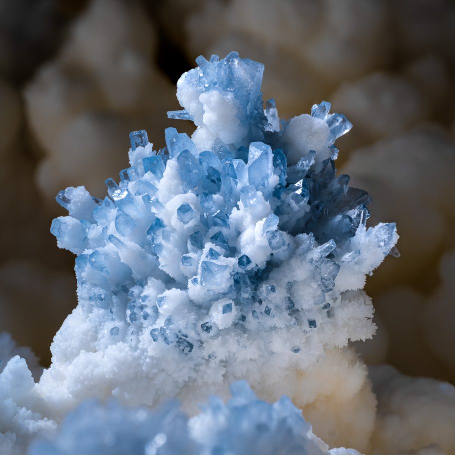 Radiating cluster of sky-blue celestine forming on a cave coralloid