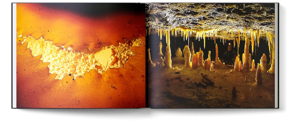 Sample double page of the 'Inside Mother Earth' book showing orange calcite speleothems
