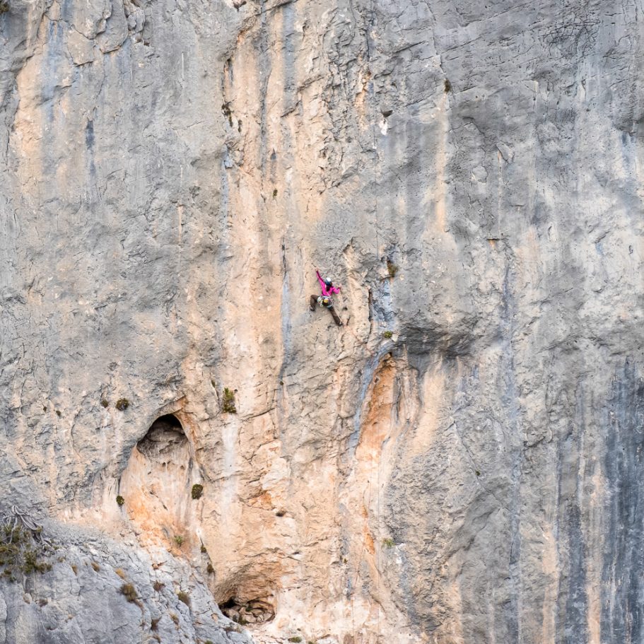 Climber on a limestone cliff